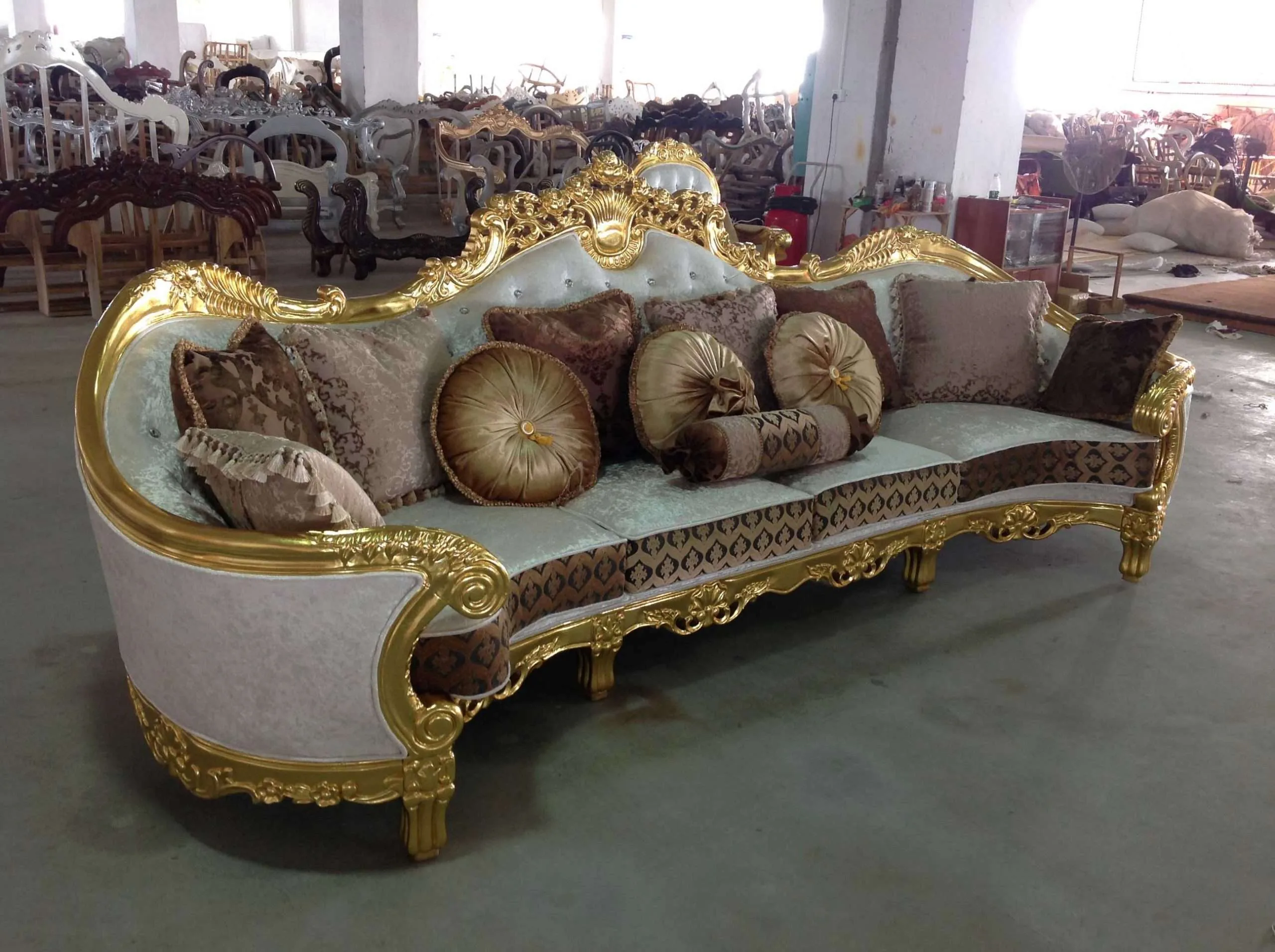 Luxury golden five seater sofa